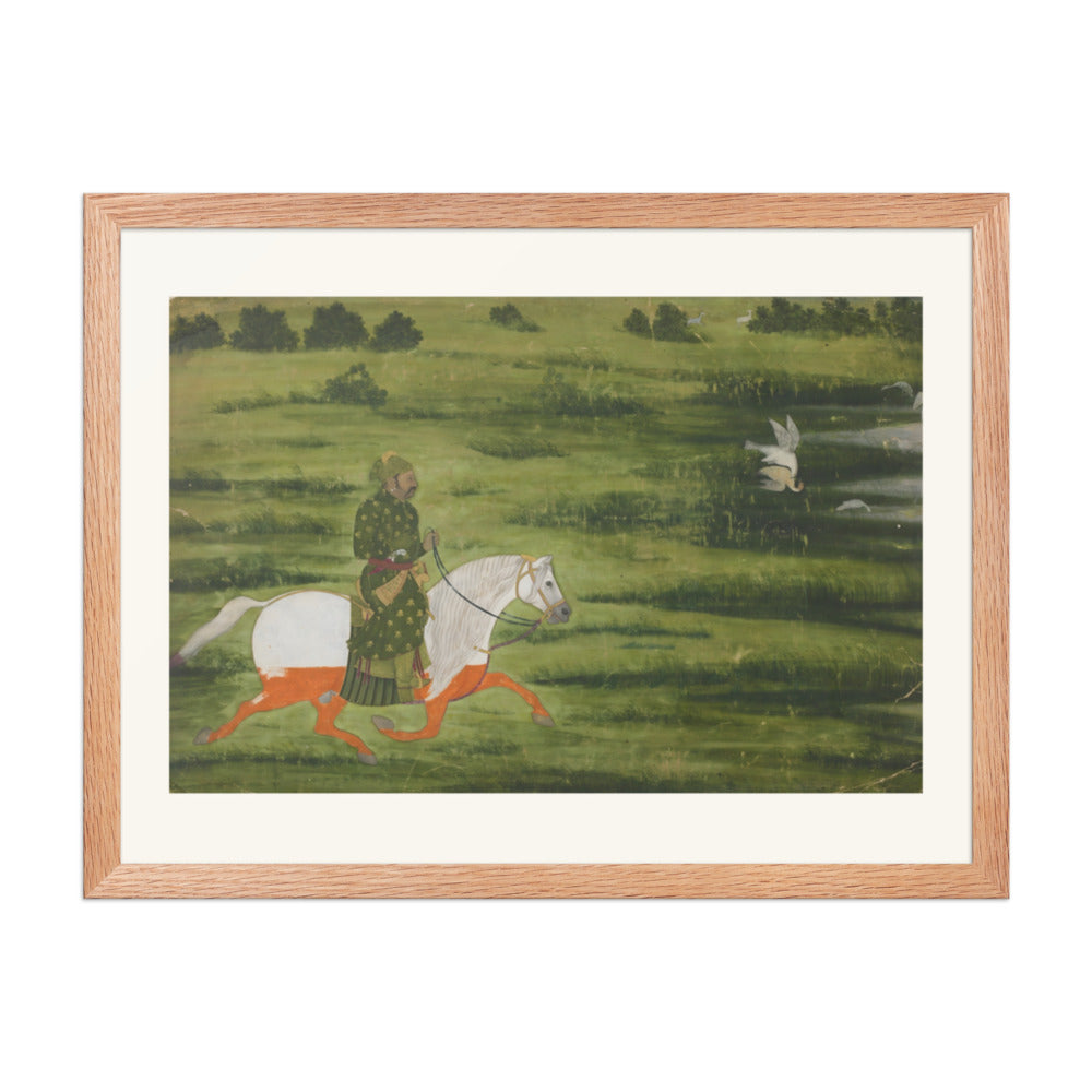 A mounted man hunting birds with a falcon — view 2