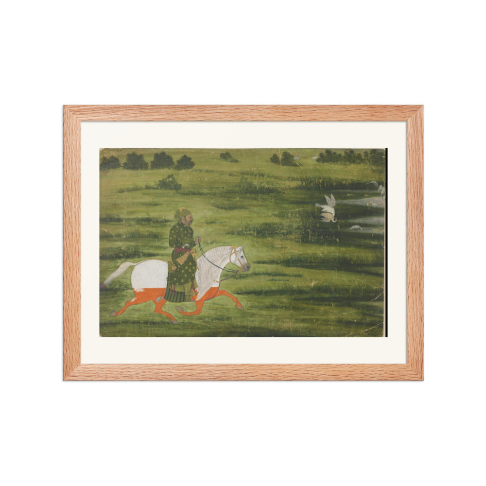 A mounted man hunting birds with a falcon — view 2