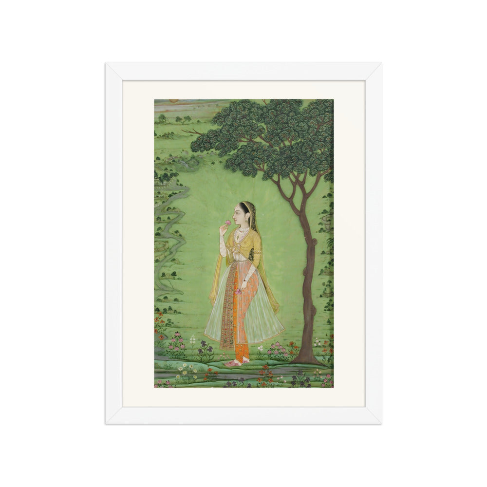 A woman standing by a tree, holding a flower — view 3