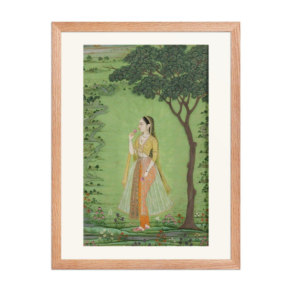 A woman standing by a tree, holding a flower — view 5